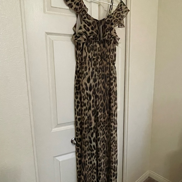 This dress has never been used and still has the tags attached. - Picture 2 of 4
